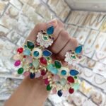 earrings are traditional Indian Kundan and pearl chandbali earrings