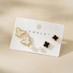 stainless steel 6-piece earring set featuring heart-shaped drops and studs.