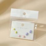 stainless steel 6-piece earring set featuring heart-shaped drops and studs.