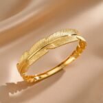 vintage-inspired feather cuff bangle