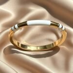 white enamelled brass cuff bracelet.