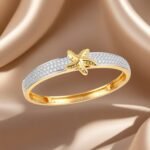 gold-toned starfish charm bracelet