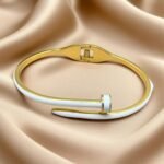 Palmonas 18k gold-plated nail bangle bracelet for women.