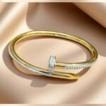 nail-inspired pavé embellished bangle,