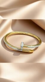 nail-inspired pavé embellished bangle,