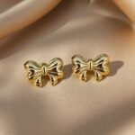 gold bow stud earrings are available