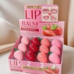 Huda Matte Me Strawberry Lip Balms in strawberry-shaped containers.1p