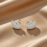 iconic Swarovski Swan stud earrings