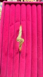 a gold-plated bangle bracelet - Image 2