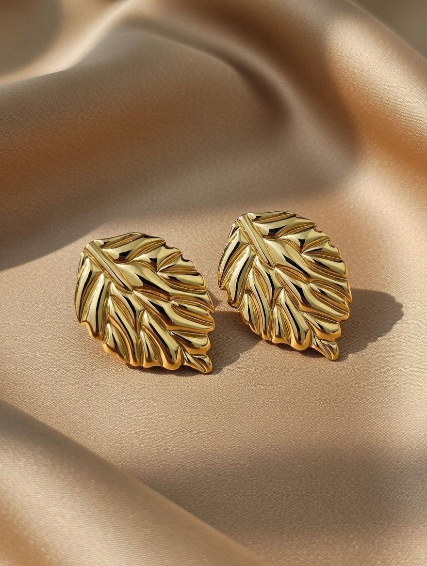 photo_26_2026-02-21_11-53-26.jpg gold-plated leaf-shaped stud earrings are reminiscent - Image 1