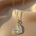 gold-plated brass pendant shaped like a heart,