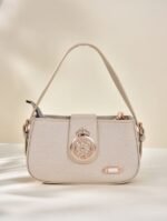 small white or beige handbag. - Image 2