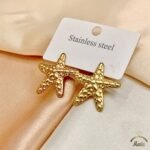 "Maria" branded gold-plated stainless steel starfish stud earrings.