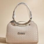 Guess Canaria mid-size satchel crossbody bag in a stone (beige) color and faux pebbled leather material.
