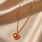 repurposed vintage Chanel button repurposed into a necklace,