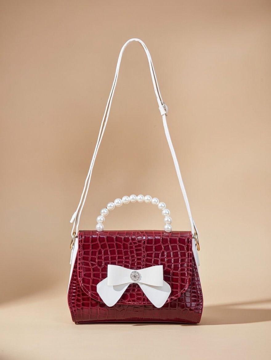 photo_8_2026-01-19_14-53-12.jpg red crocodile pattern women's shoulder bag with a bow accent. - Image 1