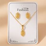 gold-plated chain necklace and matching stud earrings,