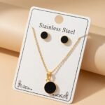 gold-plated chain necklace and matching stud earrings,
