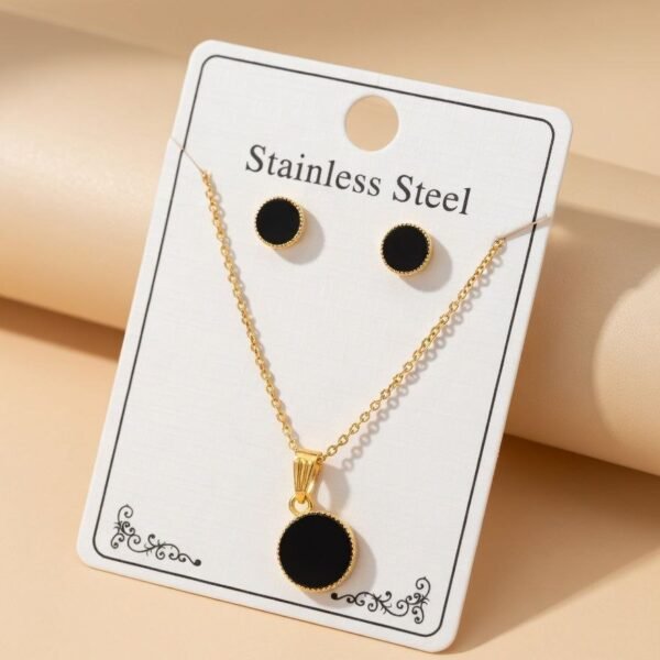 gold-plated chain necklace and matching stud earrings,