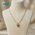 gold-toned heart pendant necklace,