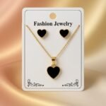 gold-plated chain necklace and matching stud earrings,