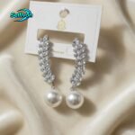 earrings are a pair of Long Marquise Cubic